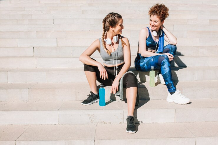 cute girls in sportswear on stairs 23 2147758004