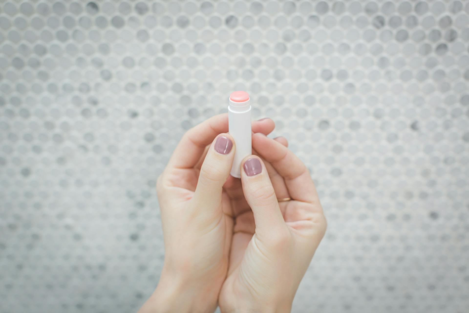 Eco lipstick held in hands