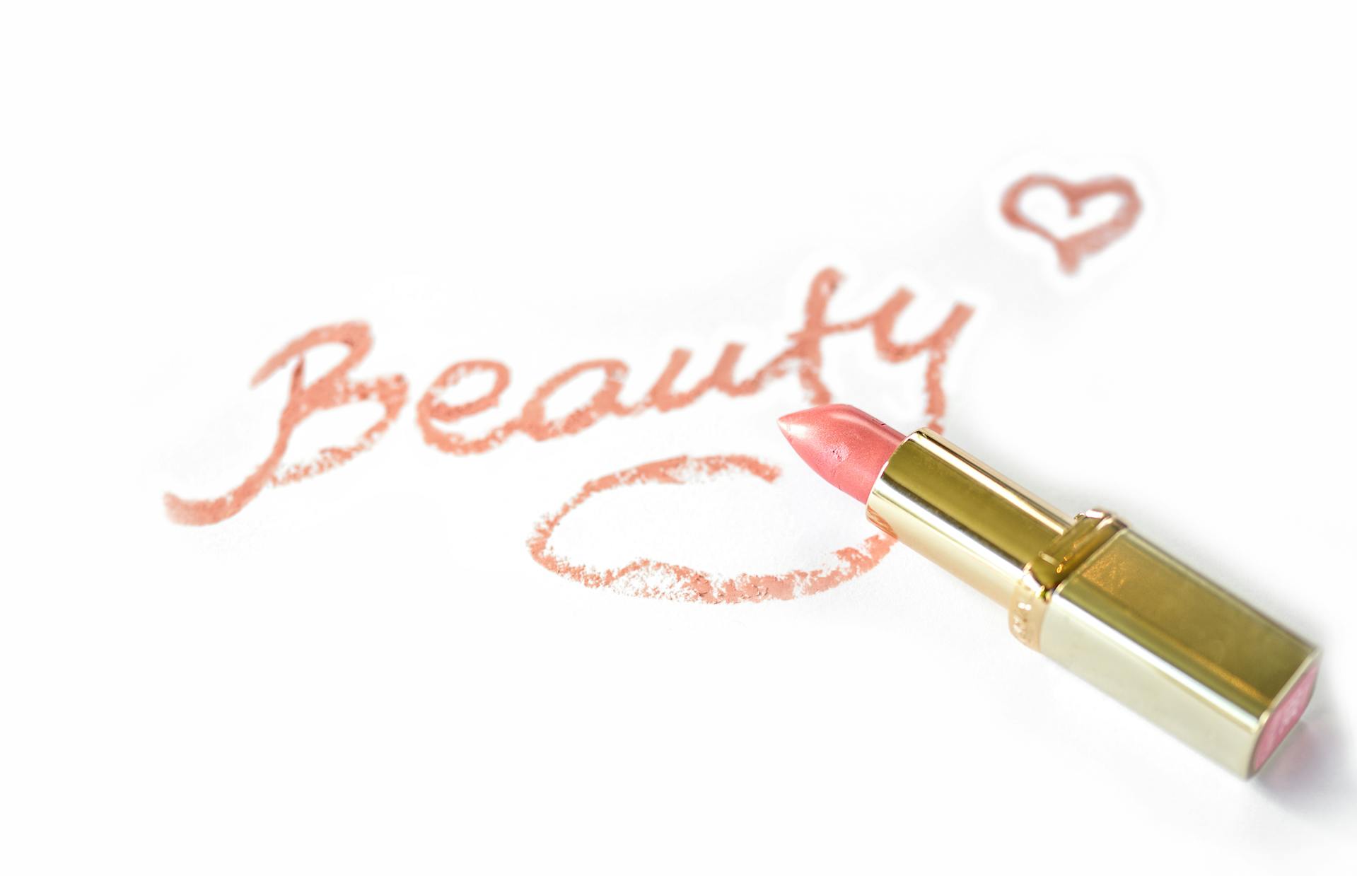 The word "Beauty" written in lipstick