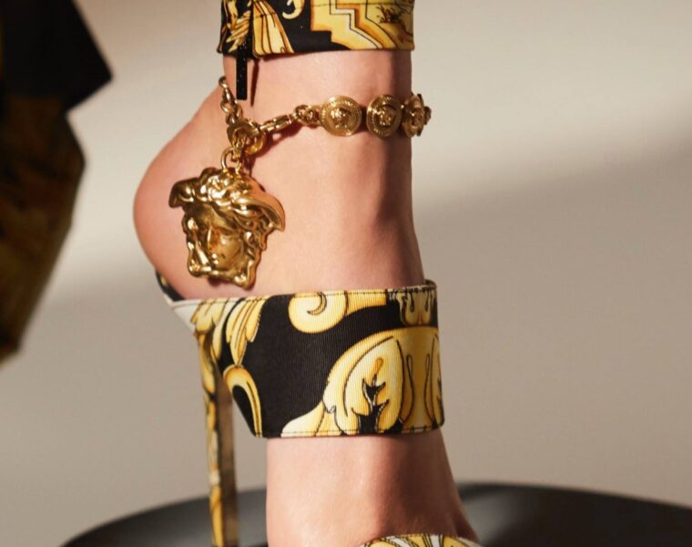 what is on the versace badge