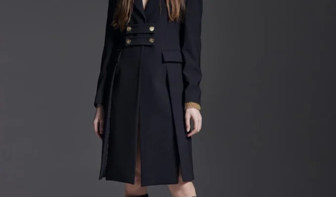Monique Garconne black long coat – history, style, and practical perspective
